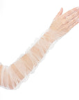 A person's arm is extended with a sheer, ruffled, white fabric sleeve covering it from wrist to upper arm, resembling the elegance of THE KATHERINE - Opera Length Ruched White Tulle Gloves by LadyFinch.