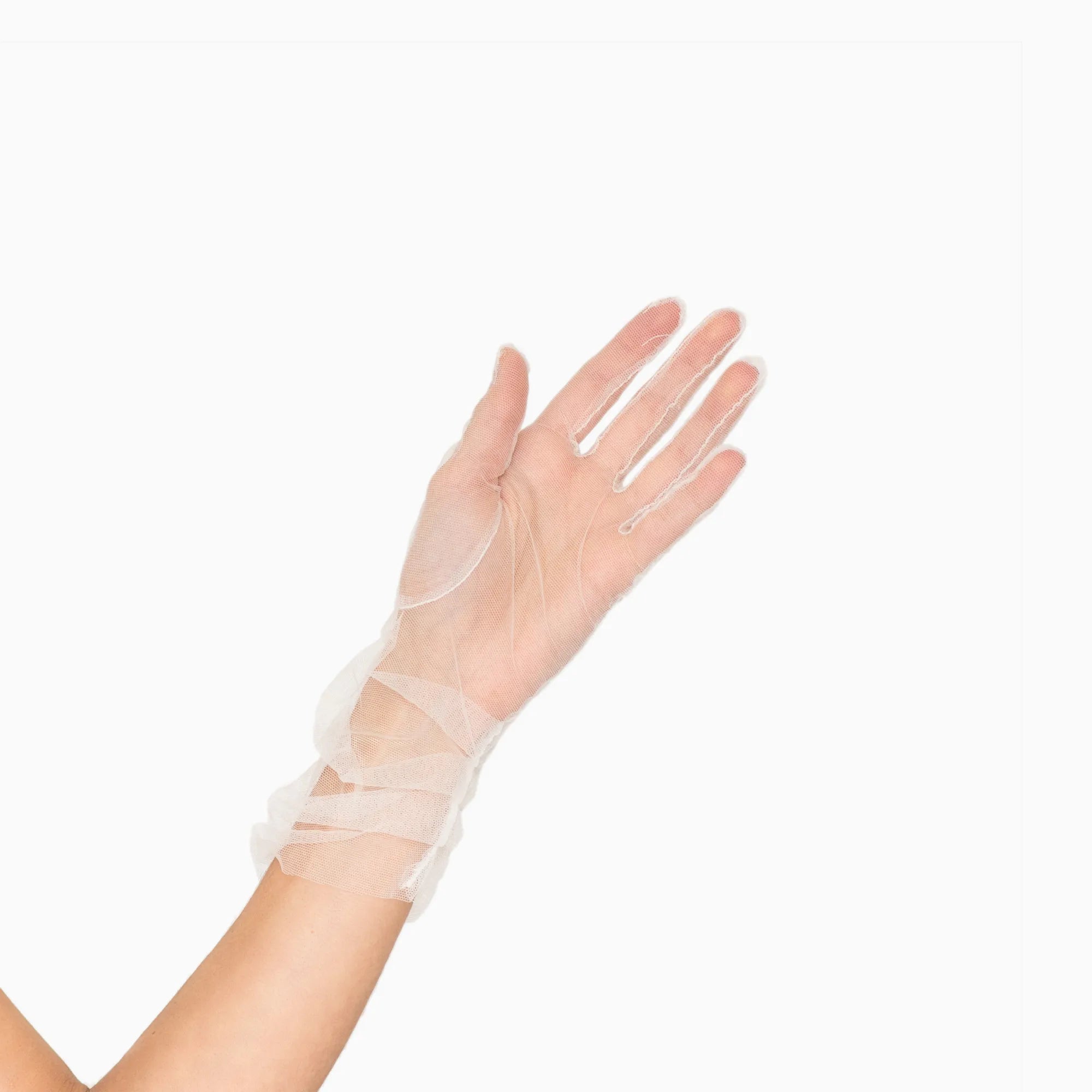 Womans hand wearing white tulle mid length ruched gloves.
