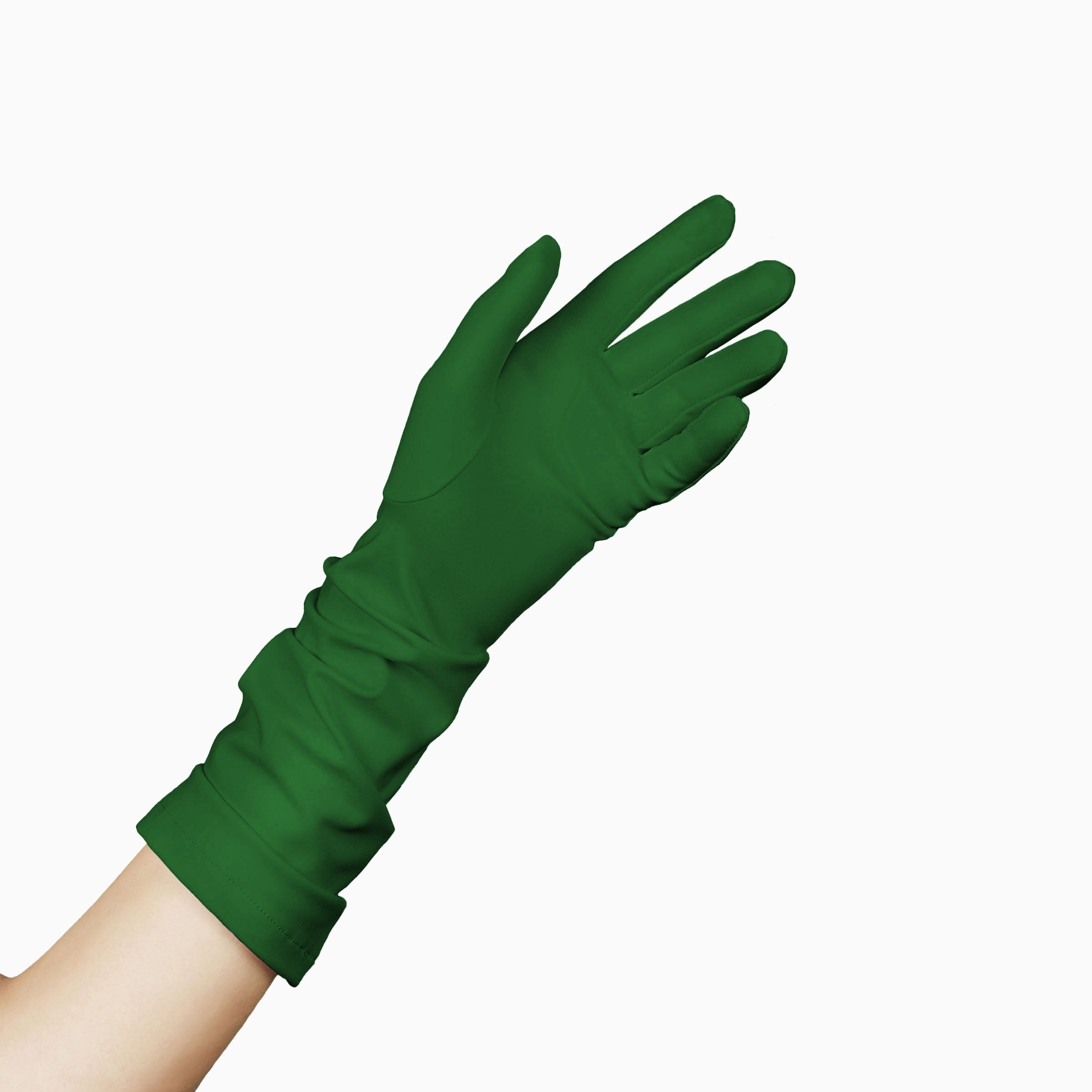 An elegant woman donning THE JILL - Green Mid Length Glove - Holiday Edition gloves from LadyFinch.