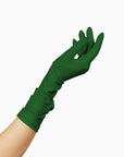 An elegant woman donning a pair of THE JILL - Green Mid Length Glove - Holiday Edition latex gloves by LadyFinch.