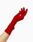 A woman's hand in THE JILL - Red Mid Length Glove - Holiday Edition gloves by LadyFinch, machine-washable and ruched.