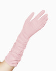 THE STEPHANIE Open palm of hand, wearing long, elbow length, pink gloves.