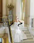 Bride in modern dress wearing opera black long gloves.