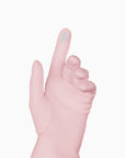 Pink women's glove against white background showing technology friendly index finger.
