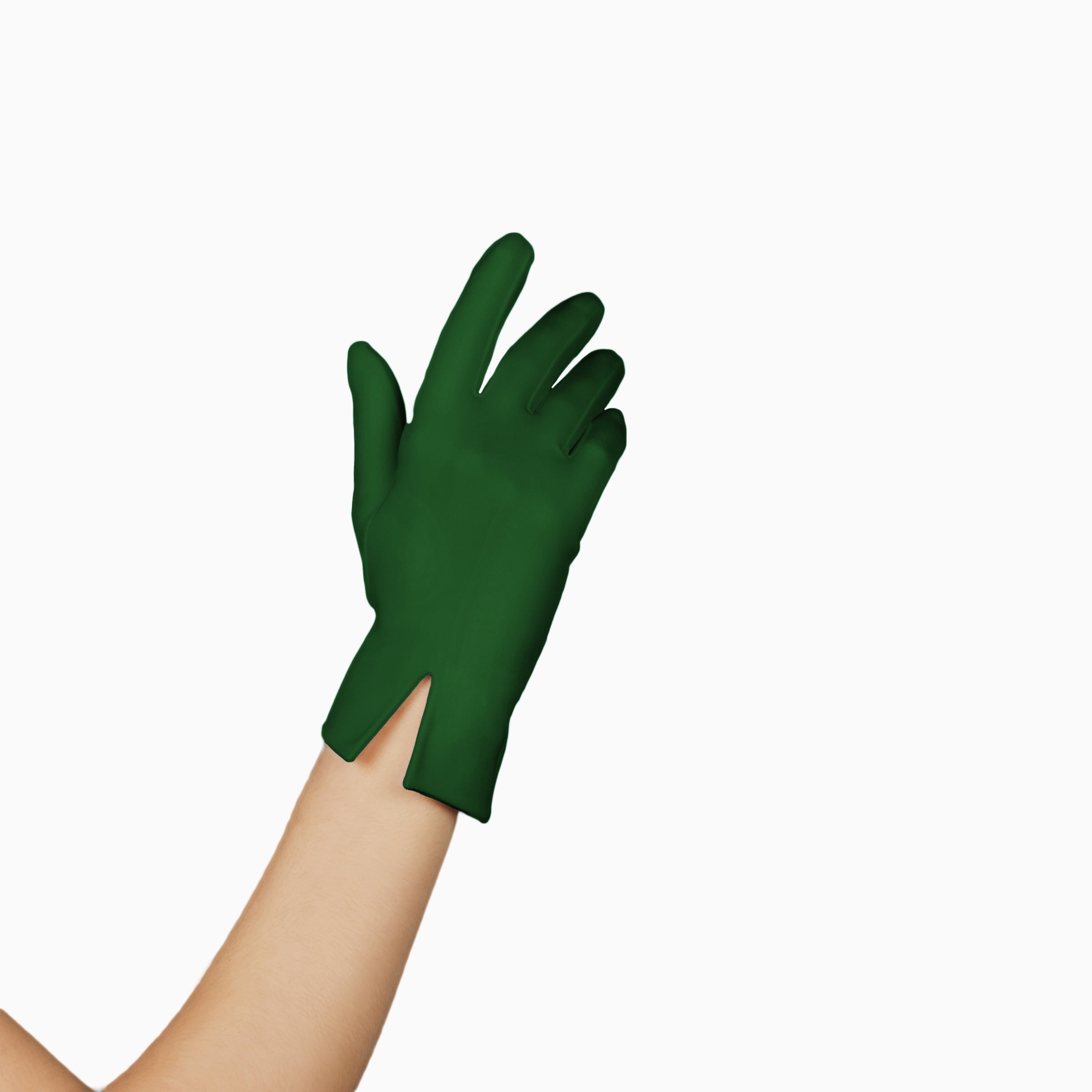 A woman spreading holiday cheer with THE ISABELLE - Green Day Glove - Holiday Edition gloves adorned with touchscreen index fingers by LadyFinch.