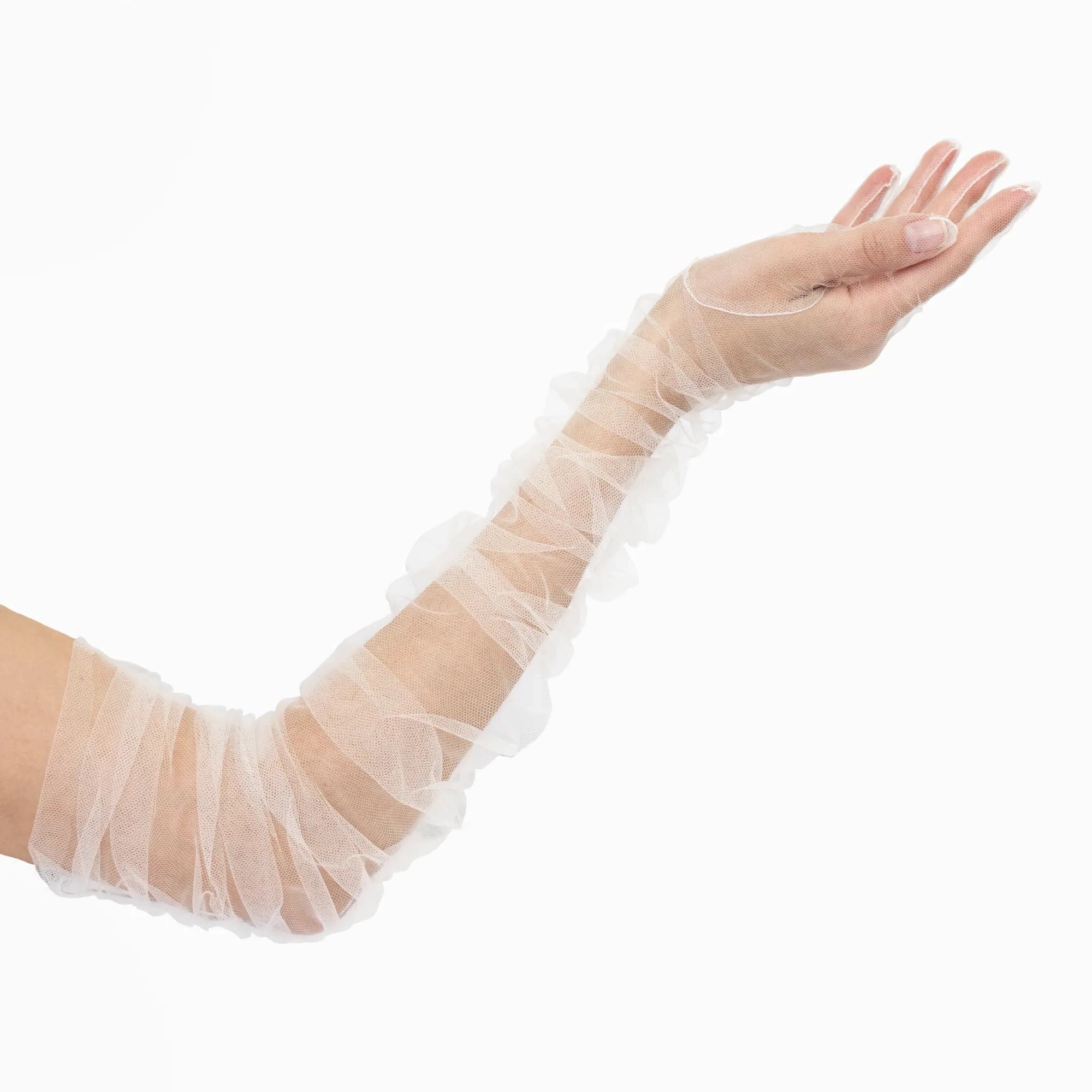 Close-up of a person's arm wearing THE KATHERINE - Opera Length Ruched White Tulle Gloves by LadyFinch, extending from the wrist to above the elbow.