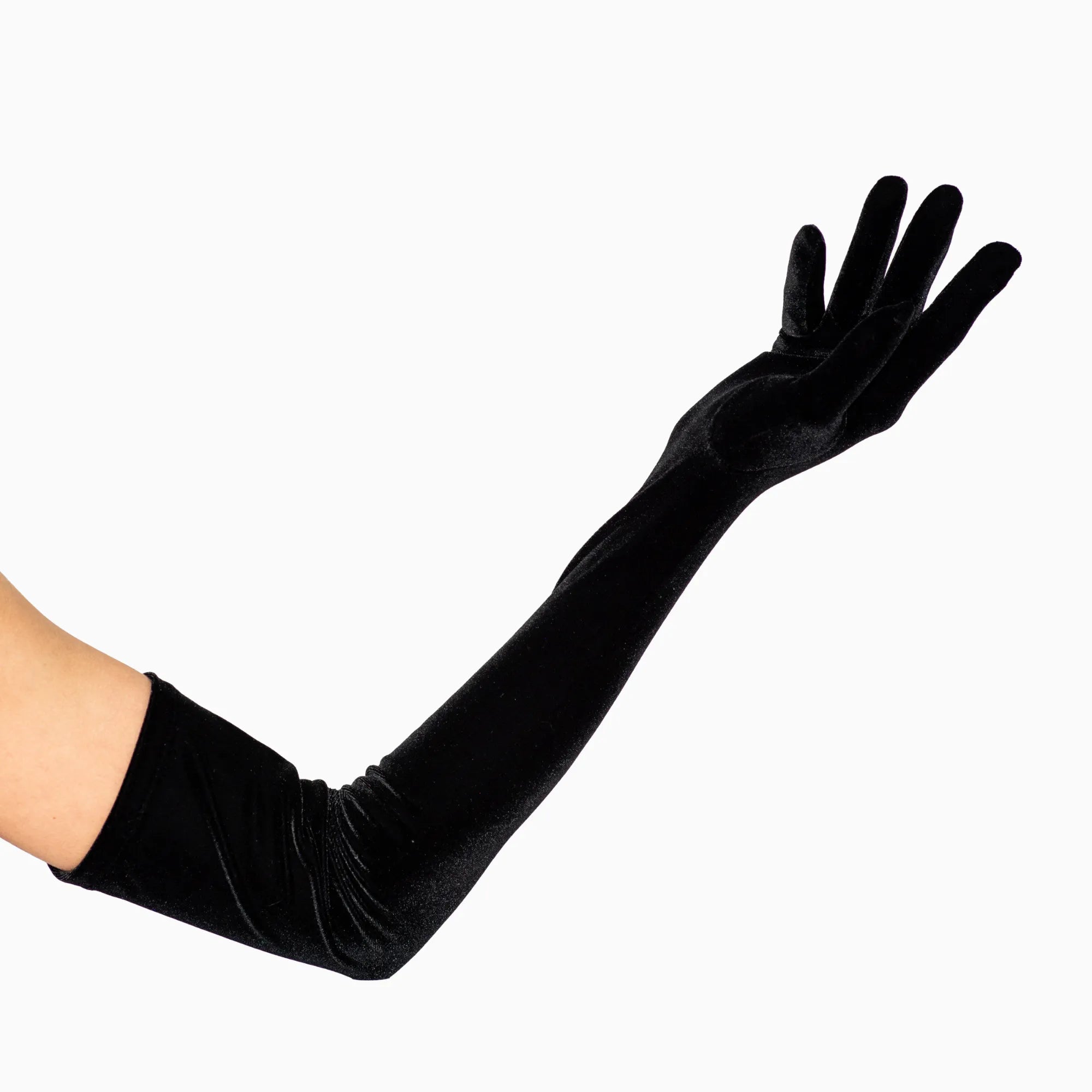 Black velvet opera gloves over the elbow.