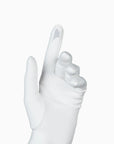 White women's glove against white background showing technology friendly index finger.